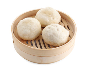 Delicious chinese steamed buns in bamboo steamer isolated on white