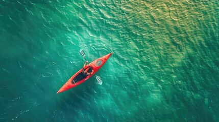 Fototapeta premium Red kayak swimmer on the lake in summer