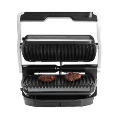 Electric grill with tasty meat steaks isolated on white