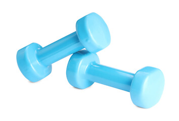 Light blue dumbbells isolated on white. Sports equipment