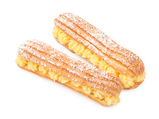 Delicious eclairs filled with cream isolated on white