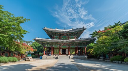 Obraz premium The Temple of Heaven amidst a gentle snowfall, creating a picturesque winter scene with snow-covered roofs and surroundings. 