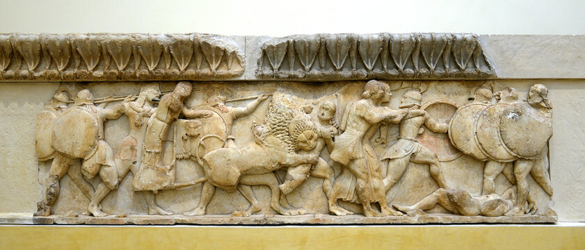 Fragment of relief sculpture shows the myth of the conflict - the battle of the Olympian gods against the Giants. Archaeological museum, Delphi, Greece, UNESCO World Heritage Site