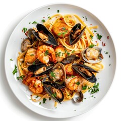 Seafood Linguine pasta with mussels, clams, and scallops on a white plate, top view