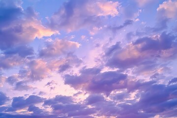 Obraz premium Gentle purple clouds at sunset, in soft pastel tones