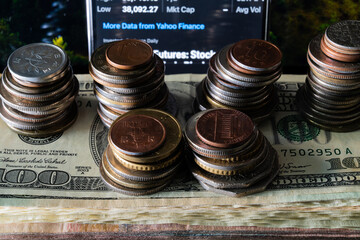 View of the coin stack on the banknote pile