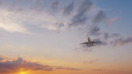 Airplane in the sky at sunset. Air transportation.  Travel. Airplane Takes Off Against the Background of Blue Sky. 
