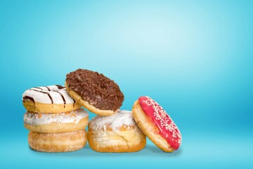 Creative Colourful glazed sweet doughnut with sprinkles