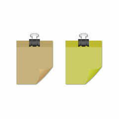 A collection of sticky notes with bent corners and shadows on clips. 