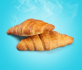Single plain tasty croissant baked pastry