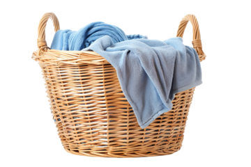 Wicker laundry basket filled with soft blue blankets, perfect for home organization, laundry room decor, and cozy living spaces.