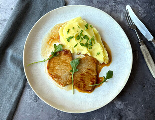 Pork Minute Steaks with Mashed Potatoes and Gravy.