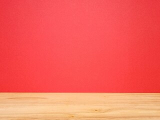 Red wall and wooden floor