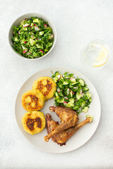 Chickpea cutlets with mixed salad with cucumbers and radishes, baked farm chicken legs, a delicious hearty lunch or dinner