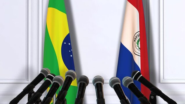 Paraguay and Brazil National Flags with Microphones. Official Press Conference of Countries Government
