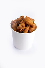 Fried chicken wings and legs in a bucket.