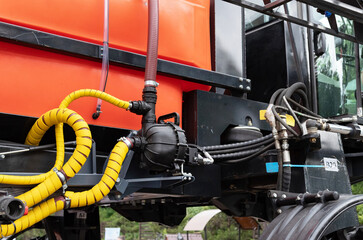 Fragment of yellow industrial diesel engine for electrical generator in power station