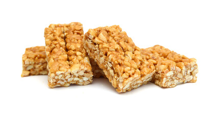 Honey bars with peanuts, sesame and sunflower seeds isolated