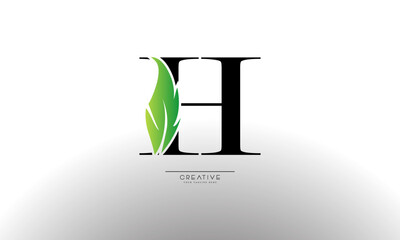 Letter H eco leaf logo icon design template elements. Vector color sign
