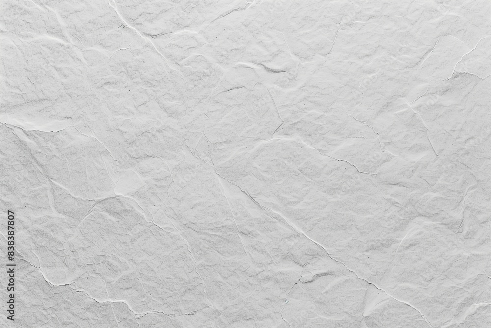 Poster textured gray paper with wrinkles, space for text or object placement in center
