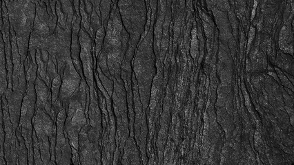 Dark grey stone black slate background, rock texture.