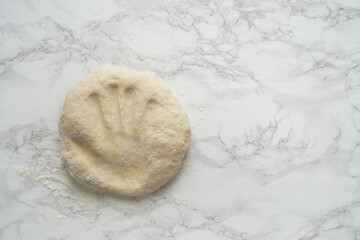 Handmade Dough With a Small Child's Palm Print