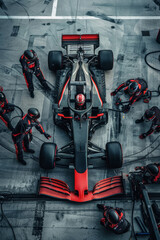 Equipo de formula uno realizando un pit stop en una carrera, coche de carreras parado en boxes haciendo un pit stop con un equipo profesional