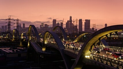 Mesmerizing 4K Drone Shot at dusk: Sixth Street Viaduct - Aerial View Connecting Downtown LA Arts...