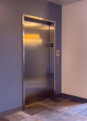 The third floor elevator door of a residential building © Brian