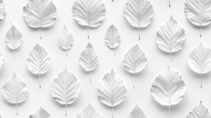   A cluster of snowflakes resting atop a pristine white canvas with some miniature ones scattered in the foreground