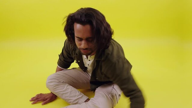 Young person sitting in asylum