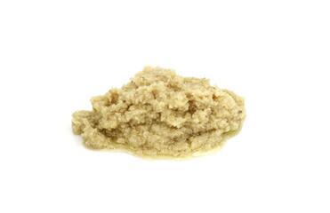 Artichoke dip isolated on a white background. Artichoke spread, pesto.