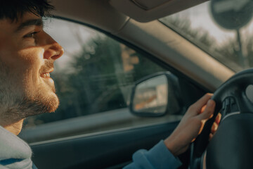 novice or young driver driving in the car