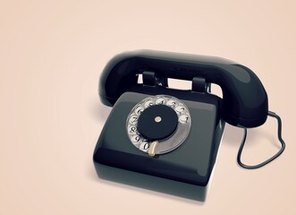 Vintage retro phone on color background