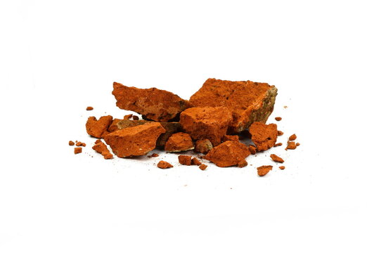 Shattered, broken bricks isolated on white background.