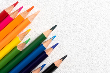 Set of colored pencils white background.