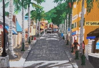 Fototapeta premium One-way, single lane Front Street, the main street of Philipsburg, St. Maarten, is lined with stores and restaurants and shaded by palm trees.