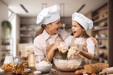 Joyful Mother And Daughter Cooking At Modern Kitchen