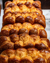 Traditional Jewish bread challah braided brioche bread in bakery
