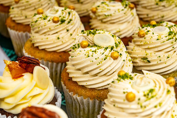 Sweet dessert fresh baked meringue cup cakes in bakery
