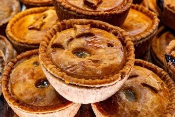 Fresh baked stuffed meat pies, Britisch pastries, snacks