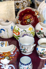 Different antique porcelaine vases and plates made in Gien, Loire valley, France