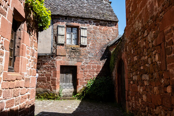Collonges-la-Rouge village, one of the most beautiful villages in France with houses made from red stones, tourists destination in Dordogne