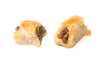 Delicious sweet baklava with walnuts isolated on white background.