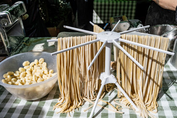 Italian food, fresh homemade pasta tagliatelle ready to cook on Portobello road food market, London