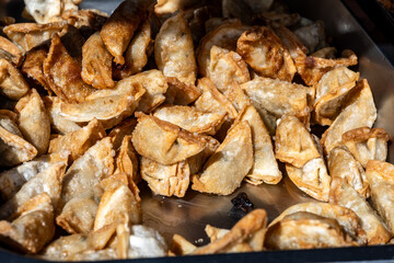 Asian food, fried in oil filled vegetarian dumplings