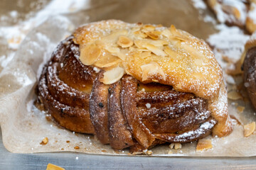 Almond scones - traditional British baked good, popular in the United Kingdom and Ireland, tea buns make with yeast with different toppings