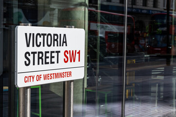 Transportation in London city, roads, road signes, street signes, warnings, indicating of directions in Great Britain, city life in England