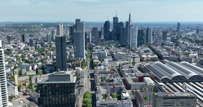 Bahnhof Frankfurt am Main, railway station, and city skyline.