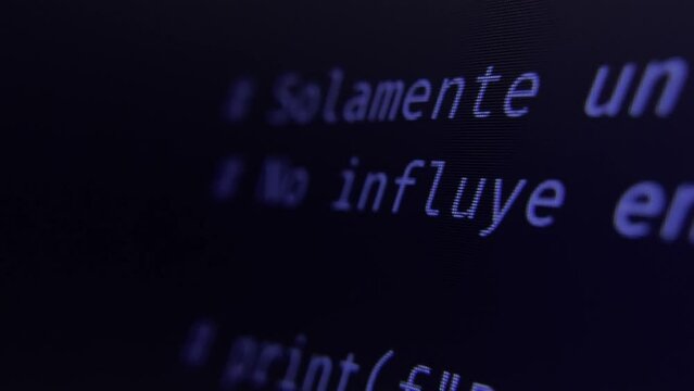 Programming lines of code. Close up of a screen showing lines of code scrolling fast.
